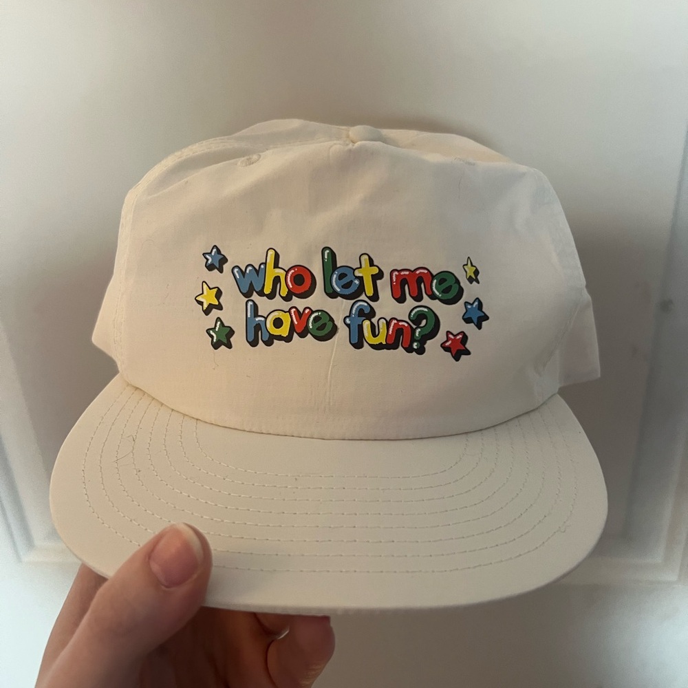 cream color graphic hat